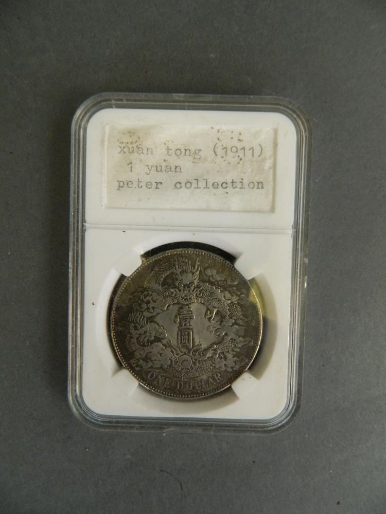 A facsimile (replica) Chinese Xuan Tong 1911 1 Yuan coin