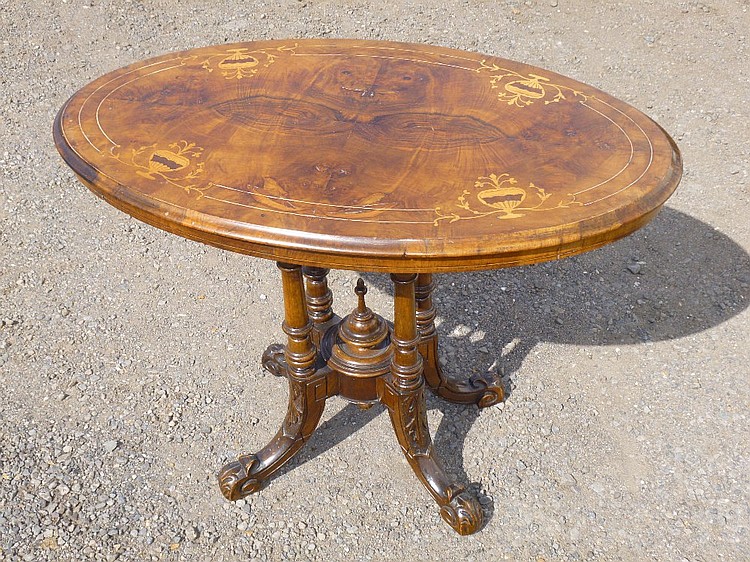 VICTORIAN WALNUT TABLE WITH AN INLAID FLORAL OVAL TOP