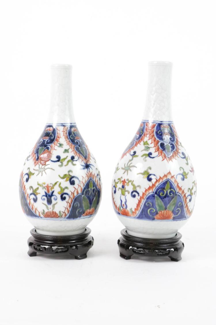 Pair of Chinese porcelain vases with bases
