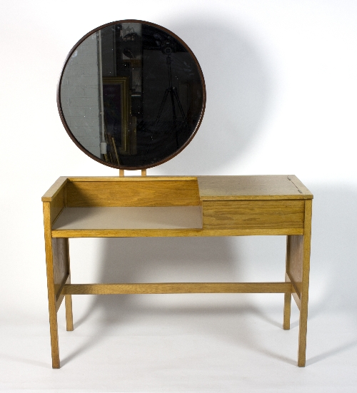 G-Plan, a 1960s oak dressing table, mounted with a circular mirror, 102cm wide