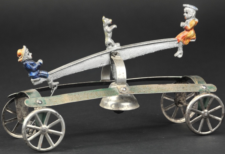 WATROUS BOY AND GIRL ON SEESAW BELL TOY