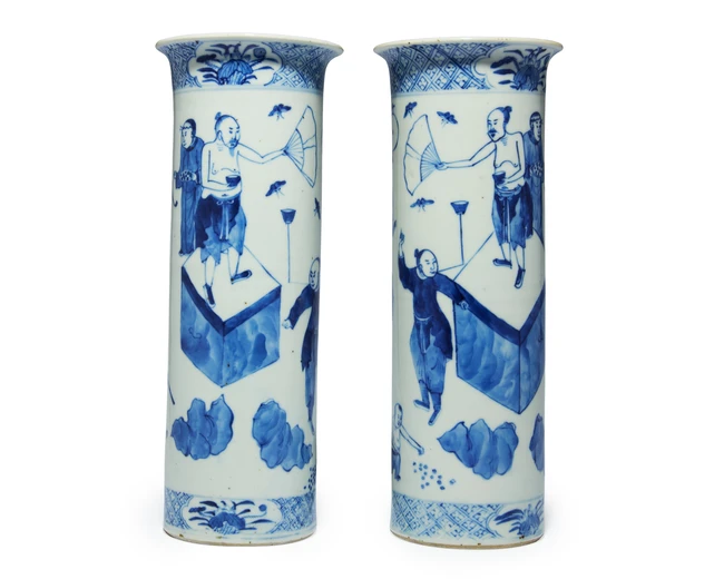 A pair of Chinese 'hundred trades' sleeve vases Qing dynasty