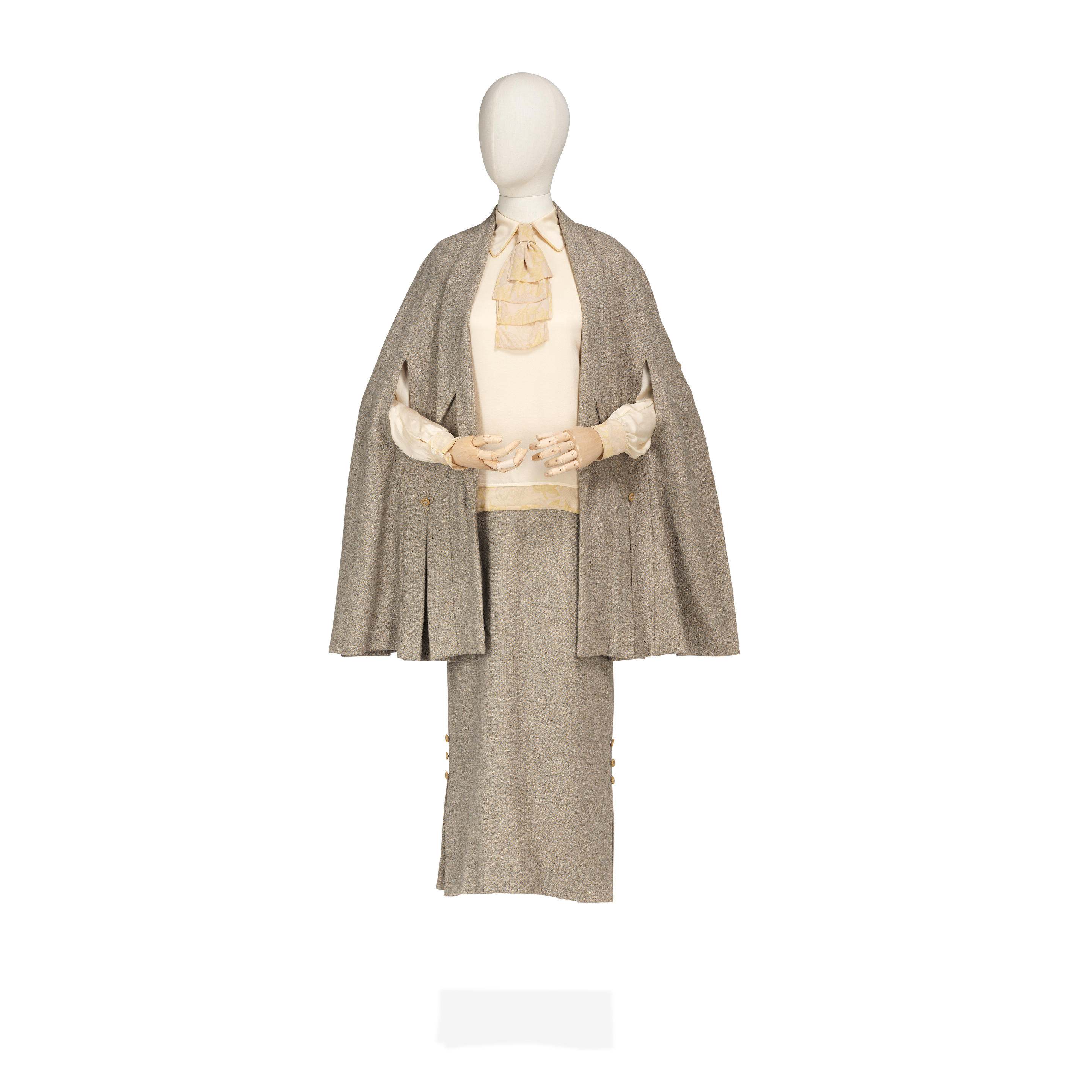 Laura Carmichael (as Lady Edith): Workwear cape and skirt ensemble