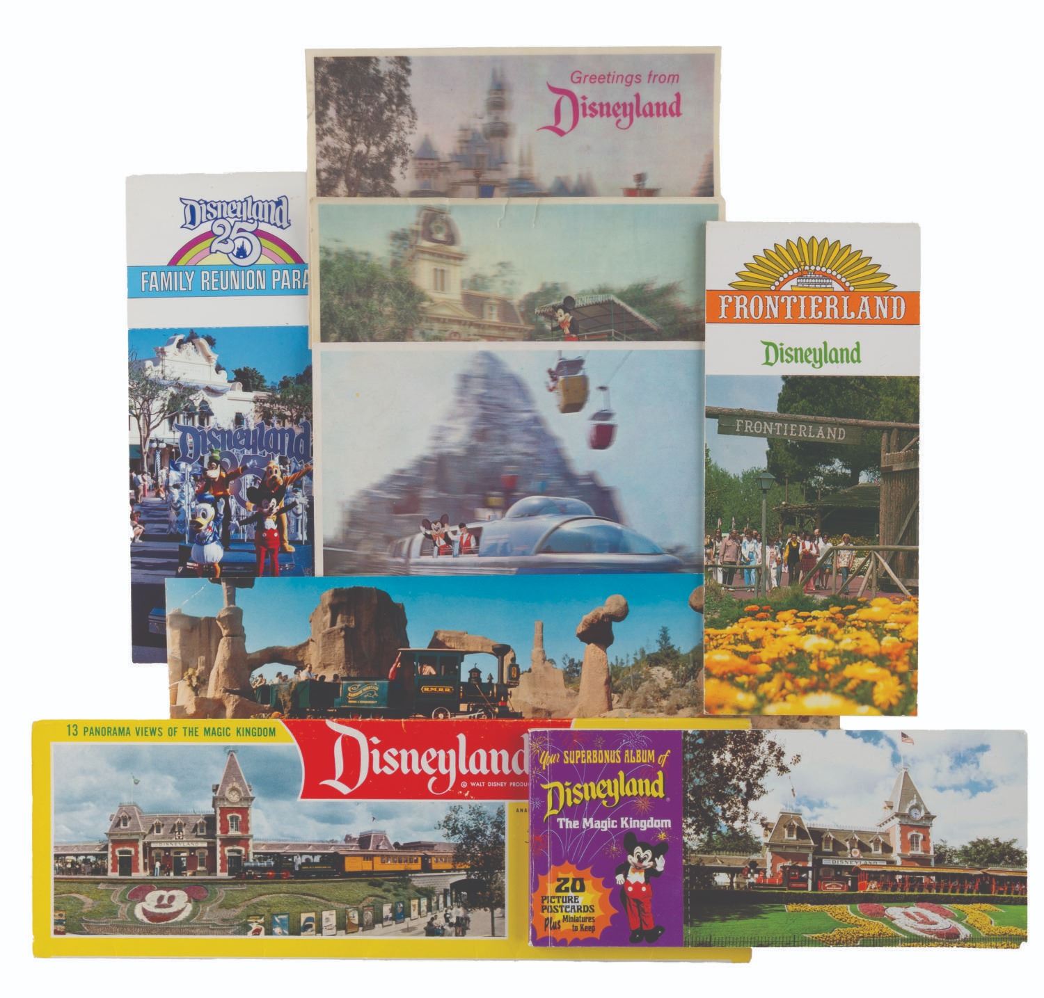 A Collection of Disneyland Postcards and Postcard Books.