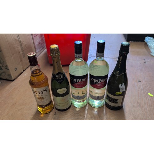 A group of assorted bottled spirits and sparkling wines incl...