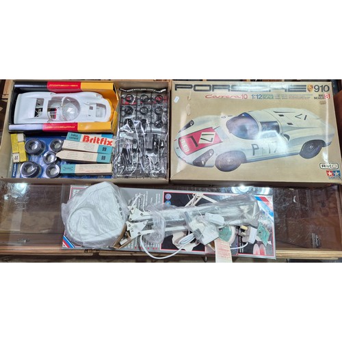 A Tamiya Porsche 910 Carrera 10 1.:12 model kit, unbuilt in ...