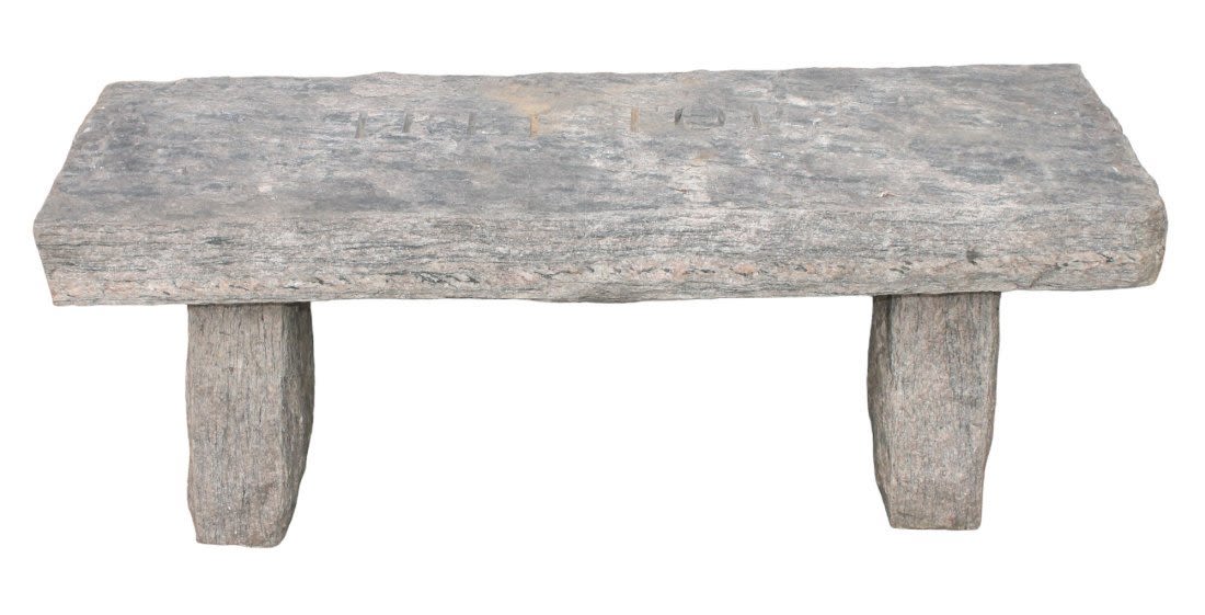 Carved granite garden bench